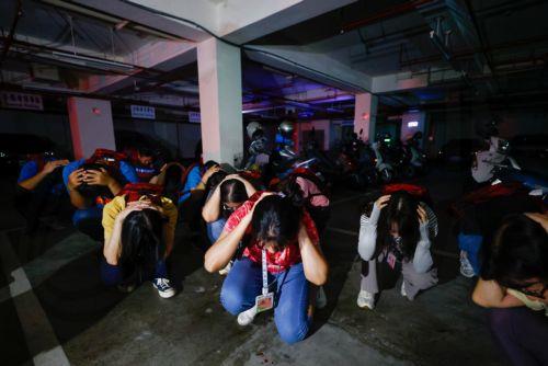 epa13158709 People take shelter during the Wan-An Air raid drill or Urban Resilience (Air Defense) Drill as part of the annual Han Kuang military exercises in Taichung, Taiwan, 10 August 2026. Taiwan’s Han Kuang exercises test combat readiness against a potential Chinese invasion.  EPA/RITCHIE B. TONGO