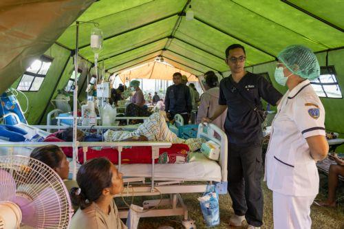 epa13176574 Patients at Aeramo Hospital receive treatment in a makeshift tent outside the hospital building following a 7.7 magnitude earthquake in Mbay, East Nusa Tenggara province, Indonesia, 18 August 2026. According to the National Search and Rescue Agency of Indonesia (BASARNAS), a 7.7 magnitude earthquake struck off the coast of East Nusa Tenggara...