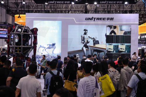 epa13180344 Attendees gather at the Unitree stand during the 2026 World Robot Conference in Beijing, China, 20 August 2026. The WRC event runs from 19 to 23 August.  EPA/WU HAO