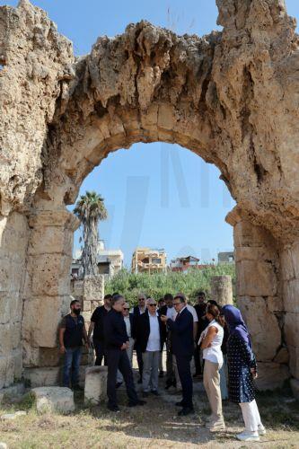 epa13180364 Lebanese Culture Minister Ghassan Salame (4-R) and UNESCO Director General Khaled El-Enany (front-L) during their visit to the al-Bass ruins district in Tyre, southern Lebanon, 20 August 2026. Israeli air strikes have hit areas in the ruins district and near the ancient Roman hippodrome during the conflict between Israel and Hezbollah,...