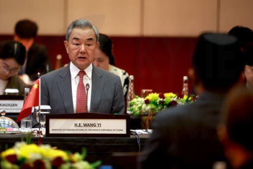 epa13182107 China's Foreign Minister Wang Yi (C) delivers his remarks as his Indonesian counterpart Sugiono (R) looks on during a meeting in Jakarta, Indonesia, 21 August 2026. Wang Yi is in an official visit to Indonesia to attend comprehensive strategic dialogue Indonesia-China.  EPA/MAST IRHAM