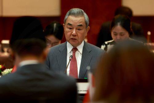 epa13182109 China's Foreign Minister Wang Yi (C) delivers his remarks as his Indonesian counterpart Sugiono (L) looks on during a meeting in Jakarta, Indonesia, 21 August 2026. Wang Yi is in an official visit to Indonesia to attend comprehensive strategic dialogue Indonesia-China.  EPA/MAST IRHAM