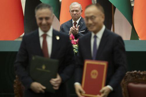 epa13188434 King Abdullah II of Jordan applauds during a signing ceremony with China’s President Xi Jinping (not pictured) at the Great Hall of the People in Beijing, China, 24 August 2026.  EPA/ANDRES MARTINEZ CASARES / POOL