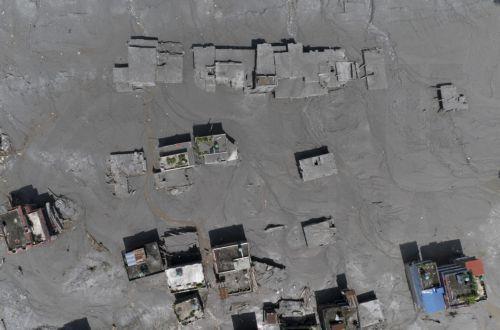 epa13194389 An aerial view of damaged homes in Delight village following a flash flood, in Nuwakot district, Nepal, 27 August 2026. More than 160 people have died and hundreds remain missing across northern Nepal after a suspected avalanche triggered massive flash floods and mudslides along the Bhotekoshi and Trishuli river near the Nepal-Tibet border,...