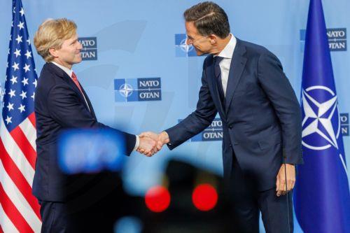 epa13194409 US Under Secretary of War for Policy Elbridge Colby (L) shakes hands with NATO Secretary General Mark Rutte during a meeting at the North Atlantic Treaty Organization (NATO) headquarters, in Brussels, Belgium, 27 August 2026. Colby will later participate in a meeting of the North Atlantic Council with Allied Ambassadors.  EPA/OLIVIER MATTHYS
