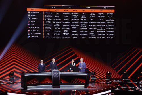 epa13196495 German former soccer player Sebastian Rode (C) reveals the 2026/27 UEFA Europa League league phase draw at the Grimaldi Forum in Monaco, 28 August 2026.  EPA/SEBASTIEN NOGIER