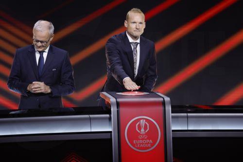 epa13196497 German former soccer player Sebastian Rode (R) presses the button to reveal the 2026/27 UEFA Europa League league phase draw at the Grimaldi Forum in Monaco, 28 August 2026.  EPA/SEBASTIEN NOGIER