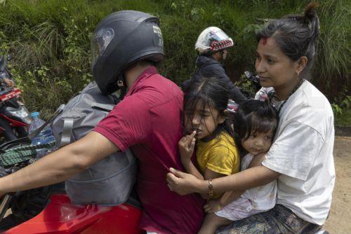 epa13196539 People make their way on a higher ground following another flash flood alert in Nuwakot district, Nepal, 28 August 2026. More than 460 people have died and hundreds remain missing across northern Nepal after a suspected avalanche triggered massive flash floods and mudslides along the Bhotekoshi and Trishuli river near the Nepal-Tibet border,...