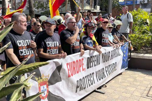 epa13202202 People attend a rally called by public servants to demand more 'Resources, Means, and Solutions' amid the migrant crisis outside the offices of the Delegation of the Central Government in Ceuta, Spain, 31 August 2026. Spain faced a massive migration crisis after thousands of people crossed into the North African enclave of Ceuta from Morocco in...