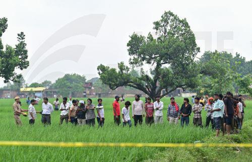 epa13202398 Villagers watch rescue works that are underway at a site after an explosion in a firecracker factory in Pipri, Uttar Pradesh state, India, 31 August 2026. The explosion in the  firecracker factory killed more than five people and several injured, according to official sources. The explosion also damaged the nearby houses.  EPA/Prabhat Kumar Verma