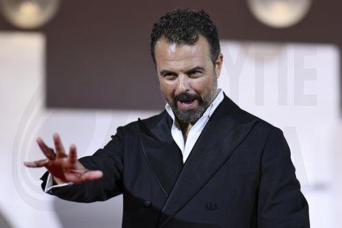 epa13226877 Italian director Edoardo De Angelis arrives for the premiere of ‘Il fuoco che ti porti dentro' (The Fire within You) during the 83rd Venice Film Festival in Venice, Italy, 09 September 2026. The movie is presented in official competition 'Venezia83' at the festival running from 02 to 12 September 2026.  EPA/ETTORE FERRARI
