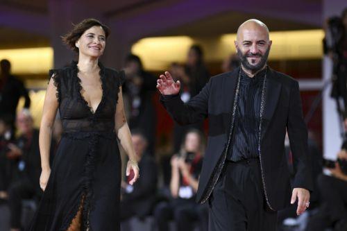epa13226919 Italian singer Giuliano Sangiorgi (R) and Ilaria Macchia arrive for the premiere of ‘Il fuoco che ti porti dentro' (The Fire within You) during the 83rd Venice Film Festival in Venice, Italy, 09 September 2026. The movie is presented in official competition 'Venezia83' at the festival running from 02 to 12 September 2026.  EPA/ETTORE FERRARI