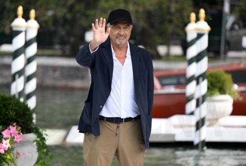epa13227817 Italian director Giovanni Veronesi arrives at the Hotel Excelsior dock in Lido Beach to present the movie 'Dio ride' during the Venice International Film Festival, in Venice, Italy, 10 September 2026. The festival runs from 02 to 12 September 2026.  EPA/ETTORE FERRARI
