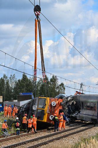 epa13228252 Heavy machinery is deployed during a locomotive lifting operation after an accident in Sokolniki Suche, Poland, 10 September 2026. Emergency response teams and technical crews worked to clear the site of a rail accident that occurred on 09 September when a truck collided with a PKP Intercity passenger train traveling on the Lublin–Szczecin...