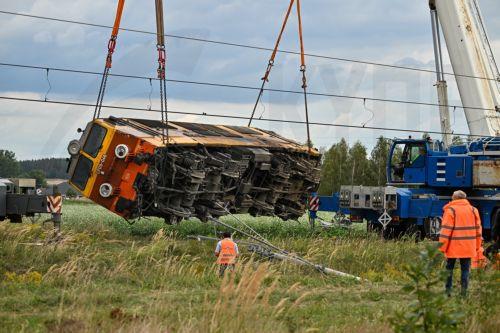 epa13228254 Heavy machinery is deployed during a locomotive lifting operation after an accident in Sokolniki Suche, Poland, 10 September 2026. Emergency response teams and technical crews worked to clear the site of a rail accident that occurred on 09 September when a truck collided with a PKP Intercity passenger train traveling on the Lublin–Szczecin...