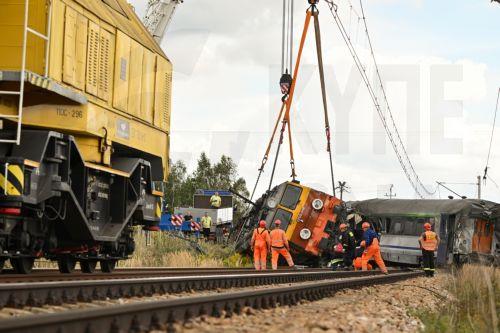 epa13228256 Heavy machinery is deployed during a locomotive lifting operation after an accident in Sokolniki Suche, Poland, 10 September 2026. Emergency response teams and technical crews worked to clear the site of a rail accident that occurred on 09 September when a truck collided with a PKP Intercity passenger train traveling on the Lublin–Szczecin...