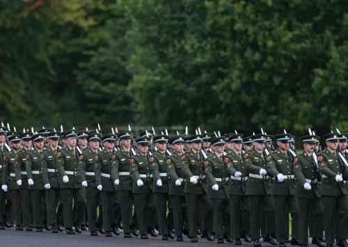 epa13233638 Military personnel line up at the Aras an Uachtarain in Dublin, Ireland, 12 September 2026. The US president is on a two-day visit to Ireland, including a visit to his golf course in Doonbeg.  EPA/NEIL HALL