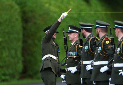 epa13233640 Military personnel line up at the Aras an Uachtarain in Dublin, Ireland, 12 September 2026. The US president is on a two-day visit to Ireland, including a visit to his golf course in Doonbeg.  EPA/NEIL HALL