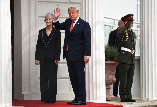 epa13233646 Ireland's President Catherine Connolly (R) greets US President Donald Trump (L) at Aras an Uachtarain in Dublin, Ireland, 12 September 2026. The US president is on a two-day visit to Ireland, including a visit to his golf course in Doonbeg.  EPA/NEIL HALL