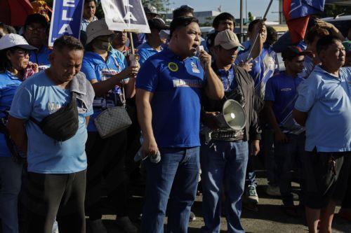 epa13238176 Members of a public transport group hold a protest as part of a transport strike in Quezon City, Metro Manila, Philippines, 14 September 2026. A public transport organization called Manibela (steering wheel), went on strike to protest fuel price hikes that have been affected by the Middle East conflict. Manibela leaders have called on the...