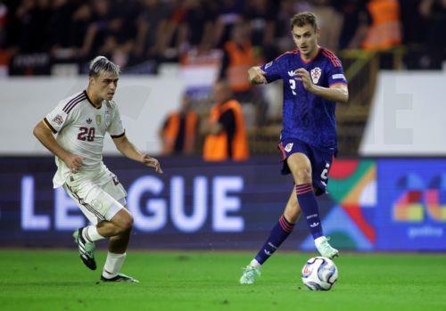 epa13285806 Spain’s Pedri L) and Croatia's Josip Stanisic in action during the UEFA Nations League match Croatia against Spain, in Split, Croatia, 06 October 2026.  EPA/MAJA PRGOMET