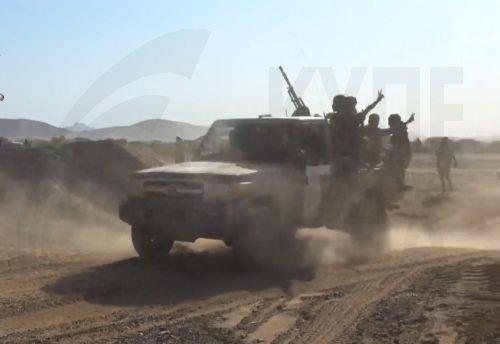 epa13286167 A handout photo made available by the Southern Giants Brigades media office shows pro-government fighters riding a truck during an offensive against Houthi positions in a coastal area of Taiz province, near the Bab al-Mandeb Strait, Yemen, 06 October 2026. The Saudi-backed Yemeni government launched an offensive to retake areas under Houthi...