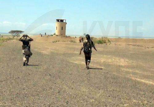epa13286169 A handout photo made available by the Southern Giants Brigades media office shows pro-government fighters holding positions during an offensive against Houthi positions in a coastal area of Taiz province, near the Bab al-Mandeb Strait, Yemen, 06 October 2026. The Saudi-backed Yemeni government launched an offensive to retake areas under Houthi...