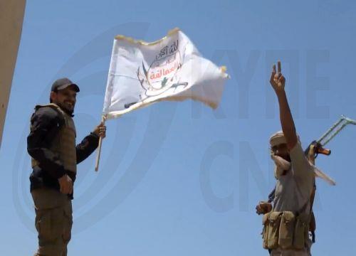 epa13286170 A handout photo made available by the Southern Giants Brigades media office shows pro-government fighters holding positions during an offensive against Houthi positions in a coastal area of Taiz province, near the Bab al-Mandeb Strait, Yemen, 06 October 2026. The Saudi-backed Yemeni government launched an offensive to retake areas under Houthi...