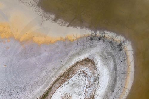 epa13289199 This picture, taken by a drone, shows the muddy bed of the nearly dried out 30-hectare inner lake of the Tihany Peninsula on the northern shore of Balaton near Tihany, Hungary, 08 October 2026.  EPA/Tamas Vasvari HUNGARY OUT
