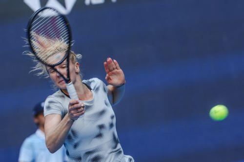 epa13293439 Katerina Siniakova of the Czech Republic in action against Erin Routliffe of New Zealand and Aldila Sutjiadi of Indonesia during her Women’s Doubles match at the China Open tennis tournament in Beijing, China, 10 October 2026. China Open runs from 28 September through 11 October.  EPA/WU HAO