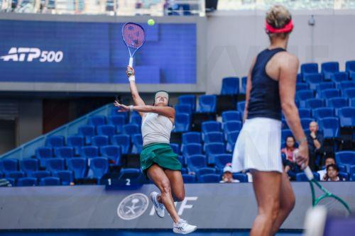 epa13293448 Erin Routliffe (R) of New Zealand and Aldila Sutjiadi (L) of Indonesia in action against Katerina Siniakova of the Czech Republic and Zhang Shuai of China  during their Women’s Doubles match at the China Open tennis tournament in Beijing, China, 10 October 2026. China Open runs from 28 September through 11 October.  EPA/WU HAO