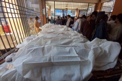 epa13306052 Parents gather beside the bodies of children killed in the collapse of a private school roof at Lady Reading Hospital in Peshawar, Khyber Pakhtunkhwa province, Pakistan, 15 October 2026. At least 17 children were killed and 20 others injured in the collapse, according to officials. Lady Reading Hospital confirmed that 17 bodies had been brought...