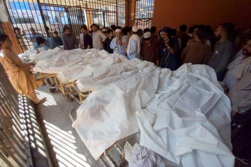 epa13306054 Parents gather beside the bodies of children killed in the collapse of a private school roof at Lady Reading Hospital in Peshawar, Khyber Pakhtunkhwa province, Pakistan, 15 October 2026. At least 17 children were killed and 20 others injured in the collapse, according to officials. Lady Reading Hospital confirmed that 17 bodies had been brought...