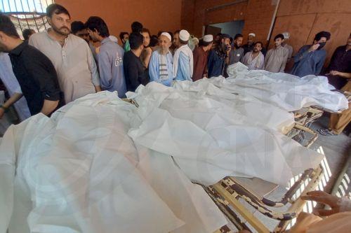 epa13306055 Parents gather beside the bodies of children killed in the collapse of a private school roof at Lady Reading Hospital in Peshawar, Khyber Pakhtunkhwa province, Pakistan, 15 October 2026. At least 17 children were killed and 20 others injured in the collapse, according to officials. Lady Reading Hospital confirmed that 17 bodies had been brought...