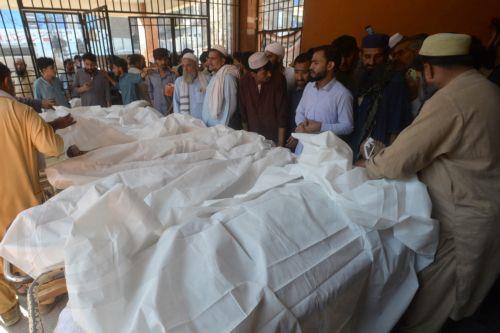 epa13306056 Parents gather beside the bodies of children killed in the collapse of a private school roof at Lady Reading Hospital in Peshawar, Khyber Pakhtunkhwa province, Pakistan, 15 October 2026. At least 17 children were killed and 20 others injured in the collapse, according to officials. Lady Reading Hospital confirmed that 17 bodies had been brought...