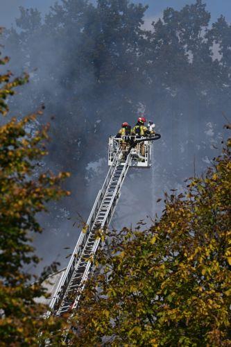 epa13309163 Firefighters fight the flames of a warehouse storing agricultural tractors in Nisko, southeastern Poland, 16 October 2026. Two firefighters were killed while fighting a fire at a warehouse storing agricultural tractor parts in Nisko. The fire broke out at around 8am, and efforts to bring it under control are still ongoing.  EPA/Darek Delmanowicz...