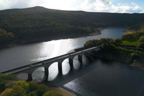 epa13309435 An aerial photograph taken with a drone of the Ladybower Reservoir which is at around 33 percent capacity, in Bamford, Britain, 16 October 2026. Most of England remains in drought as reservoir levels remain critically low after Britain experienced its hottest summer on record. A severe drought has been declared in six areas including Cornwall,...