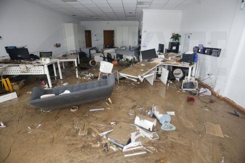 epa13315360 A view of the damage caused by the floods resulting from the passage of Storm Adam through Els Poblets, Alicante, Spain, 19 October 2026. Adam Storm has already claimed two lives and is causing 'extraordinary' rainfall and severe flooding in Valencia and Alicante, with rainfall totals exceeding 600 litres per square metre, rivers bursting their...