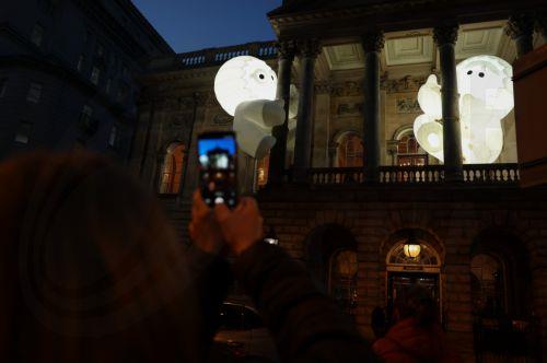 epa13323695 'The Anooki' by French design studio Inook on display on the side of Liverpool Town Hall during 'River of Light,' an illuminated outdoor art trail in Liverpool, Britain, 22 October 2026. The exhibition trail features 13 large-scale light installations based on the theme ’Together', with installations focusing on how light can bring people closer...