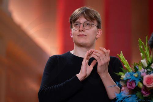 epa13324232 Ukrainian violinist Bohdan Luts reacts after winning the final of the 17th International Henryk Wieniawski Violin Competition at the Adam Mickiewicz University in Poznan, Poland, 22 October 2026.  EPA/Marek Zakrzewski POLAND OUT