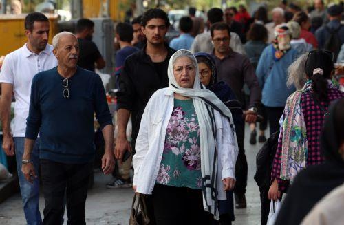 epa13336128 Iranians walk on a street in Tehran, Iran, 28 October 2026, amid the ongoing US-Iran conflict.  EPA/ABEDIN TAHERKENAREH RESTRICTIONS: NO Access Israel Media/Persian Language TV Stations Outside Iran/Strictly No Access BBC Persian/VOA Persian/Manoto TV/Iran International TV. (As mandated by Iran's Directorate General for Foreign Media) --