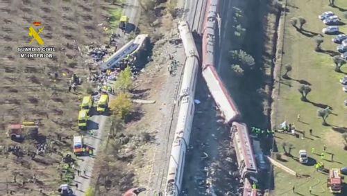 epa13336338 A handout photo made available by the Guardia Civil shows an aerial view in a frame of a video taken with a drone of the scene of the two high-speed trains (AVE in Spanish symbols), one of Renfe and another of Iryo, that have crashed in the village of Urda, Toledo, Spain, 28 October 2026. At least ten people have been killed, Spanish media...