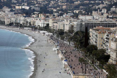 epa13341191 (FILE) -People walk on UNESCO World Heritage Site, 'Promenade des Anglais' during the lockdown in Nice, France, 21 March 2021 (reissued on 30 October 2026). 31 October, Fuzhou (China) will host World Cities Day 2026, focusing on how cities can renew their neighborhoods while ensuring adequate and affordable housing for all.  EPA/SEBASTIEN NOGIER