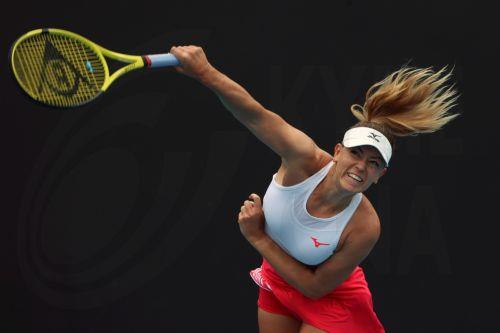 epa10408327 Dalma Galfi of Hungary in action against Qinwen Zheng of China during the first round match at the Australian Open tennis tournament in Melbourne, 16 January 2023.  EPA/FAZRY ISMAIL