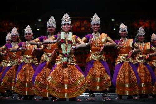 epa10647022 Entertainers perform ahead of the arrival of India's Prime Minister Narendra Modi and Australian Prime Minister Anthony Albanese for a community event at Qudos Bank Arena in Sydney, Australia, 23 May 2023.  EPA/DEAN LEWINS AUSTRALIA AND NEW ZEALAND OUT