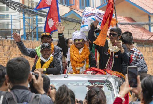 epa10647032 Double-amputee climber Hari Budha Magar, 43, reacts while returning from Mount Everest in Kathmandu, Nepal, 23 May 2023. Former British Gurkha soldier Hari Budha Magar has scaled the worldâ€™s tallest peak, Mount Everest, becoming the world's first double above-the-knee amputee to climb Mt Everest. Hari lost both of his legs while serving in...