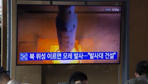 epa10662658 People watch the news at a station in Seoul, South Korea, 30 May 2023. According to the Yonhap news agency, North Korea will launch a military spy satellite in early June.  EPA/JEON HEON-KYUN