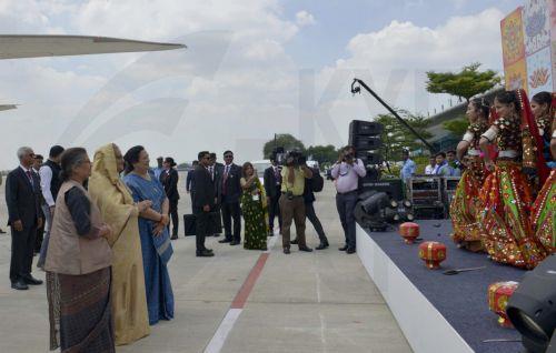 epa10847867 A handout picture made available by the Indian Press Information Bureau (PIB) shows The Prime Minister of Bangladesh, Smt. Sheikh Hasina receives warm welcome by the Union Minister of State for Agriculture & Farmersâ€™ Welfare, Smt. Shobha Karandlaje on her arrival for the G20 Summit at Palam Airforce Airport, in New Delhi, India, 08 September...