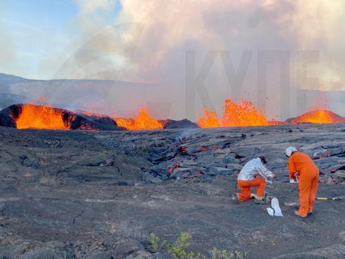 epa10855333 A handout photo made available by the United States Geological Survey (USGS) shows Geologists with the Hawaiian Volcano Observatory collecting lava samples at the KÄ«laueaâ€¯volcano following the volcanoes eruption on 10 September, in Hawaii Volcanos National Park on the island of Hawaii, Hawaii, USA 11 September 2023.  EPA/M. PATRICK / USGS...