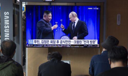 epa10855429 People watch a news segment detailing North Korean Leader Kim Jong-un's visit to Russia; at a station in Seoul, South Korea, 12 September 2023. According to North Korea's state-run media, North Korean leader Kim Jong-un is travelling by train to Russia to meet with Russian President Vladimir Putin.  EPA/JEON HEON-KYUN